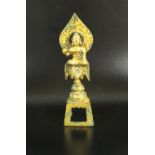 A Chinese small gilt bronze figure of a Buddha in archaic style,