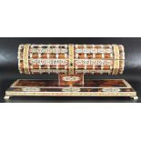 An Anglo-Indian Vizagapatan tortoiseshell veneer and ivory scroll case mounted on stand,