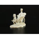 A Japanese miniature ivory carving of a Geisha being pulled along in a rickshaw, Meiji period,