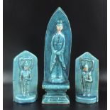 A figural stele in archaic Chinese style, with all over turquoise glaze,