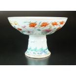 A Chinese famille rose stem bowl, 20th century, the exterior painted with a panoramic floral design,