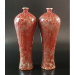 A pair of Chinese sang de boeuf glaze vases, 19th century, each of ovoid form,