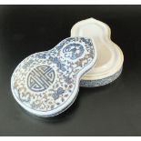 A Chinese porcelain blue and white ink palette and cover, Qing Dynasty, of double gourd form,