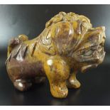 A Chinese carved hard stone 'Fu' dog, in archaic style,