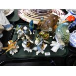 A collection of porcelain figures of various birds including Kingfisher, Woodpecker, Owl,