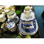 A collection of English blue and white ceramics to include two Willow pattern jug,