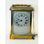 A rectangular brass carriage clock,