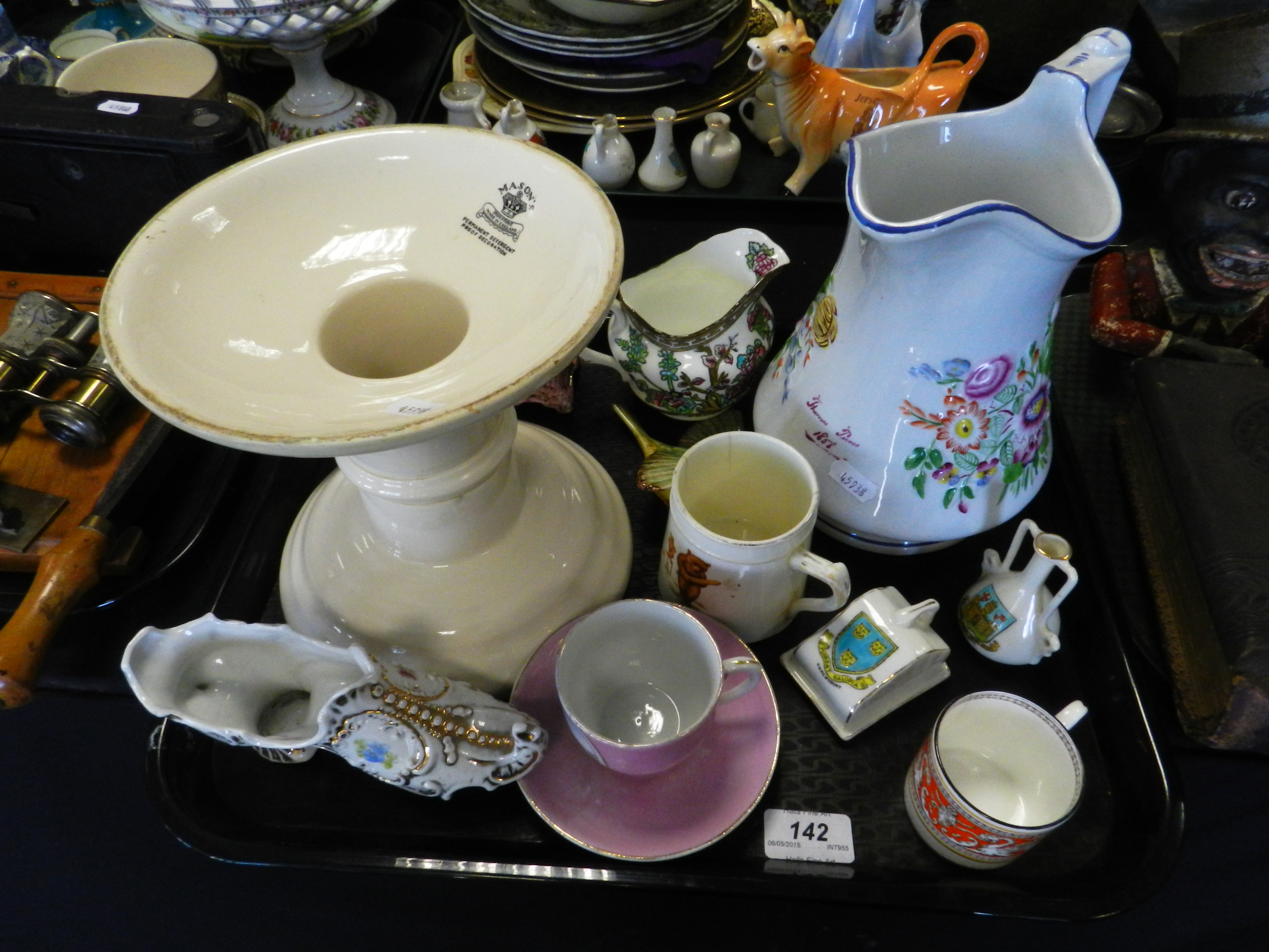 A Mason's Ironstone Butcher Shop Ham display stand, a pair of continental porcelain shoes,