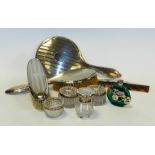 A four piece silver mounted dressing table set, hallmarked Chester, comprising a hand mirror,