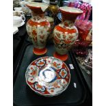 A pair of Japanese Kutani vases (chipped) together with a pair of lobed Japanese dishes