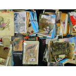 Two trays of assorted postcards, early 20th century and later, to include embroidered examples,