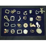 A collection of Medieval and later buckles, including a chape and tongue type V shoe buckle,