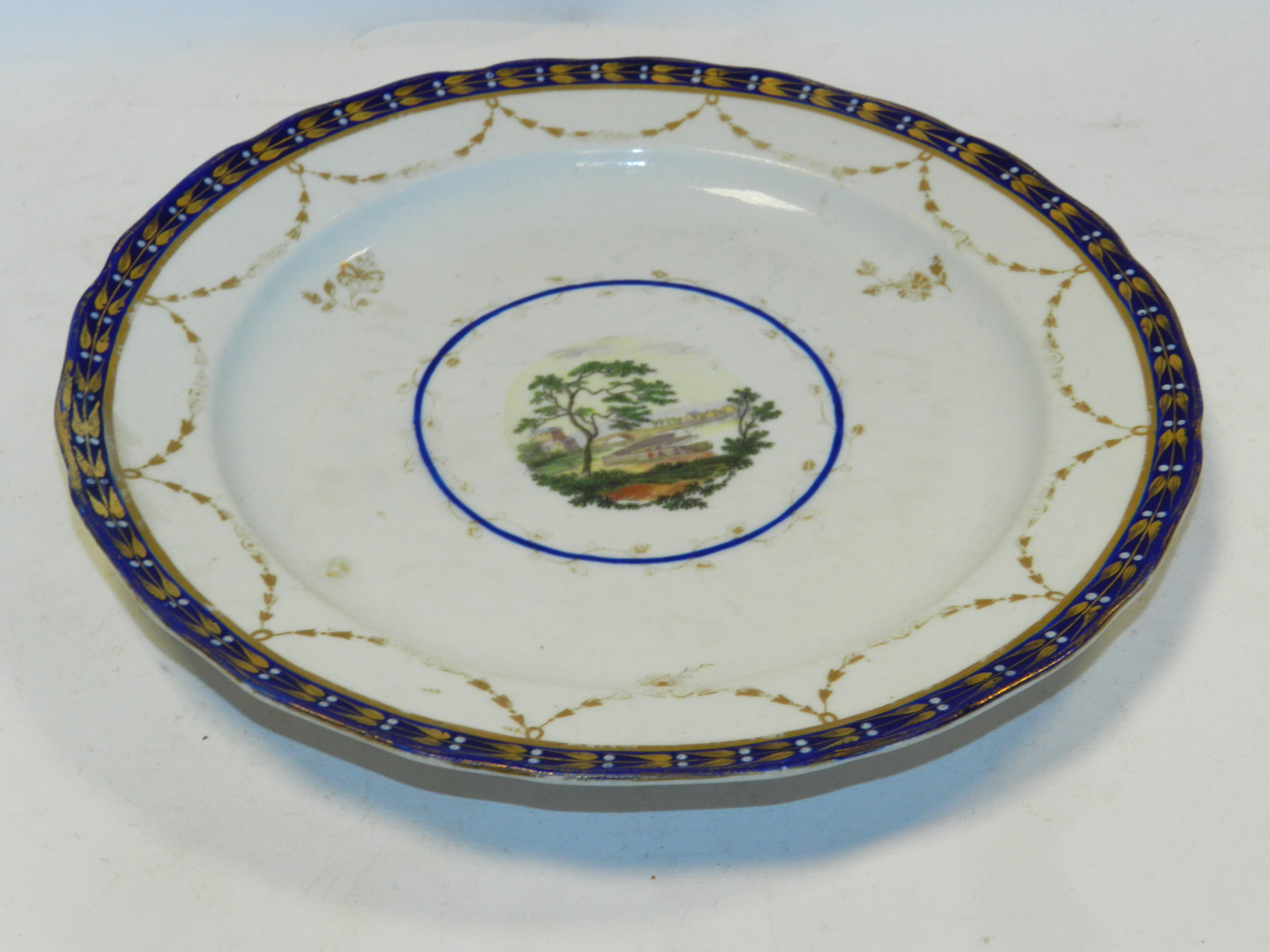 An English porcelain landscape plate, possibly Derby, circa 1790, - Image 2 of 2