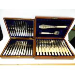 A cased set of twelve mother of pearl handled fruit knives with silver ferrules hallmarked