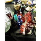 Ruby and other glassware to include a decanter and stopper and vase etched with flowers,