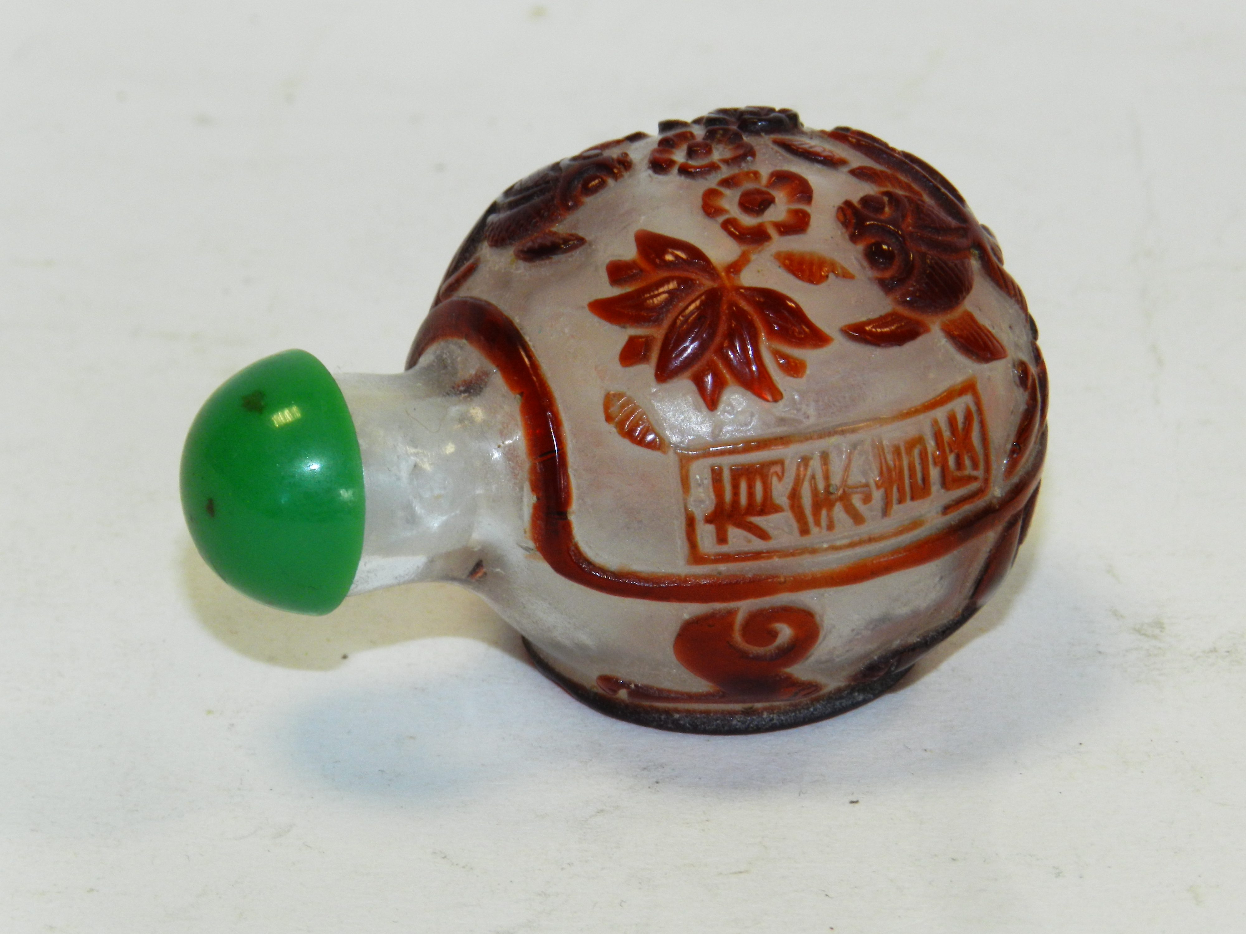 A Chinese clear and ruby glass scent bottle, 20th century,