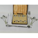 A cased set of six silver coffee spoons with bean terminals,