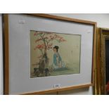 A 1950s Chinese painting on silk of a young lady under a tree playing a flute