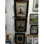 Three overpainted photographs of Victorian ladies and gentlemen in cushion moulded,