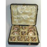 A cased set of six Royal Crown Derby Imari coffee cups and saucers dated 1910 of lobed form and