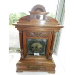 A late 19th century German walnut bracket clock,