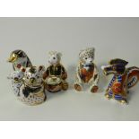 Five Royal Crown Derby Imari paperweights, including a dragon, a platypus, a seated bear,