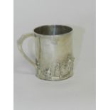 A silver christening mug, Chester 1903 of cylindrical form with reeded rim,