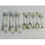 A set of six Tiffany & Co sterling silver dessert spoons and dessert forks,