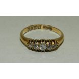 An 18 carat gold graduated five stone diamond ring