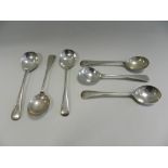 A set of six silver soup spoons, hallmarked Walker & Hall,