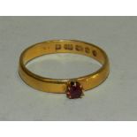 A 22 carat gold wedding band,