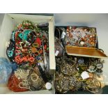 A large collection of various pieces of costume jewellery to include numerous bangles, brooches,