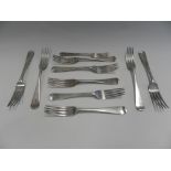 A set of four silver dessert forks hallmarked London,