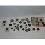 A collection of various coinage to include 1935 crown,