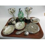 A collection of silver and plated wares to include two silver golf trophies, trinket trays,