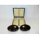 A cased pair of tortoiseshell mounted gentleman's brushes