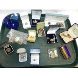 A collection of various gold and yellow metal jewellery to include three jade pendants,