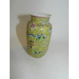 A small Chinese famille rose yellow ground vase, Republic,
