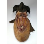 A West African Baule Tribe Mask with painted features,