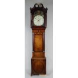 An early 19th century oak crossbanded mahogany eight day longcase clock,