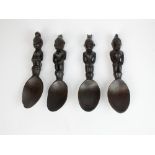 Four Philippines Ifuago carved wooden spoons - one with chip to bowl,