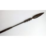 A 19th century Congolese hunting spear with barbed shaft,