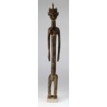 A slender West African Mossi tribe figure with base,