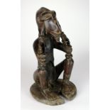 A Cameroons Grassland figure with monkey face (possibly Bamum tribe),