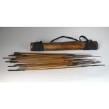 An African leather quiver with 24 metal tipped arrows,