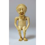 A Songye tribe carved ivory figure, Congo, early 20th century, with collection number to foot,