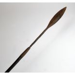 A 19th century East African spear with twisted shaft and copper binding to butt end,