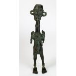 A West African Bamum bronze female figure from Cameroon, with hands held to shoulders, 40.