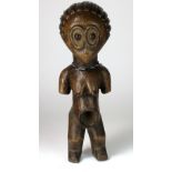 A Congo female figure with half arms, bird shaped face, possibly Luba tribe,