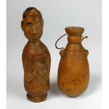 Two East Timor (Timorese) wooden lime containers, one man with folded arms, tallest 14.
